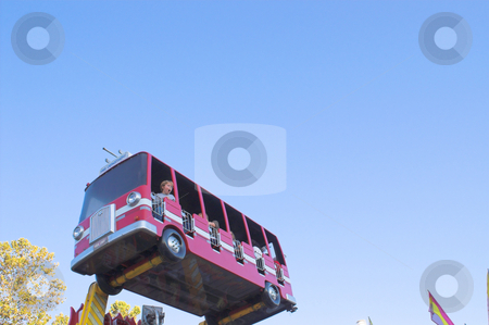 To use this stock image in your creative project, please select the size you need over to the right and click the "Add to Cart" button.
Your downloaded image will come with the Cutcaster watermark removed so don’t worry about the watermark you see on this page. Fire Truck Kiddie Ride stock photo, A fire truck kiddie ride at a carnival. by Robert Byron