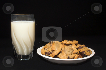 To use this stock image in your creative project, please select the size you need over to the right and click the "Add to Cart" button.
Your downloaded image will come with the Cutcaster watermark removed so don’t worry about the watermark you see on this page. Milk and Chocolate Chip Cookies stock photo, A plate full of chocolate chip cookies and a glass of milk. by Robert Byron