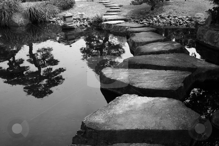 To use this stock image in your creative project, please select the size you need over to the right and click the "Add to Cart" button.
Your downloaded image will come with the Cutcaster watermark removed so don’t worry about the watermark you see on this page. Stepping Stones stock photo, Stepping stones bridge across a pond in a Japanese Garden. Black & White. Himeji, Japan. by Andrei Harwell