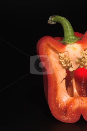To use this stock image in your creative project, please select the size you need over to the right and click the "Add to Cart" button.
Your downloaded image will come with the Cutcaster watermark removed so don’t worry about the watermark you see on this page. Red Bell Pepper stock photo, The cross section of a fresh red bell pepper. by Robert Byron
