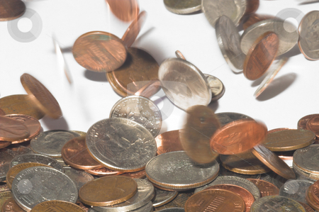 To use this stock image in your creative project, please select the size you need over to the right and click the "Add to Cart" button.
Your downloaded image will come with the Cutcaster watermark removed so don’t worry about the watermark you see on this page. Raining Coins stock photo, A mixture of various coins falling from the air. by Robert Byron