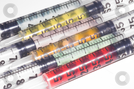 To use this stock image in your creative project, please select the size you need over to the right and click the "Add to Cart" button.
Your downloaded image will come with the Cutcaster watermark removed so don’t worry about the watermark you see on this page. Syringes stock photo, A set of colorful syringes with medication. by Robert Byron
