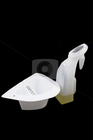 To use this stock image in your creative project, please select the size you need over to the right and click the "Add to Cart" button.
Your downloaded image will come with the Cutcaster watermark removed so don’t worry about the watermark you see on this page. Toilet Insert and Female Urinal stock photo, A toilet insert and female urinal for the collection of urine samples. by Robert Byron