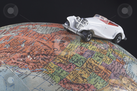 To use this stock image in your creative project, please select the size you need over to the right and click the "Add to Cart" button.
Your downloaded image will come with the Cutcaster watermark removed so don’t worry about the watermark you see on this page. World Travel stock photo, A toy car on a globe - world travel concept. by Robert Byron