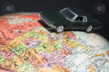 To use this stock image in your creative project, please select the size you need over to the right and click the "Add to Cart" button.
Your downloaded image will come with the Cutcaster watermark removed so don’t worry about the watermark you see on this page. World Travel stock photo, A toy car on a globe - world travel concept. by Robert Byron
