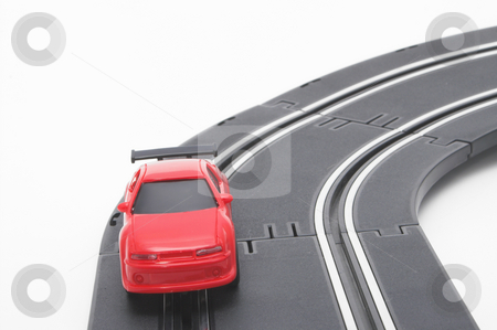 To use this stock image in your creative project, please select the size you need over to the right and click the "Add to Cart" button.
Your downloaded image will come with the Cutcaster watermark removed so don’t worry about the watermark you see on this page. Slot Car stock photo, A slot car racing on a track. by Robert Byron