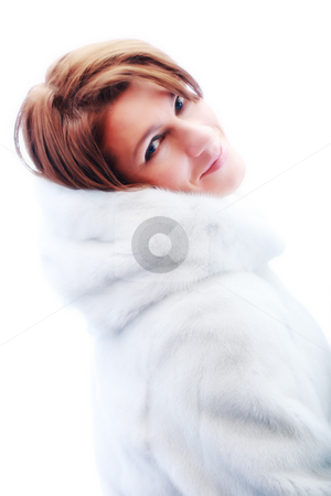 To use this stock image in your creative project, please select the size you need over to the right and click the "Add to Cart" button.
Your downloaded image will come with the Cutcaster watermark removed so don’t worry about the watermark you see on this page. Young beautiful women in the fur stock photo, A studio shot of a young beautiful women in the fur (Snow Maiden) by Andrey Yanevich