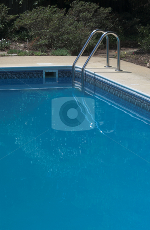To use this stock image in your creative project, please select the size you need over to the right and click the "Add to Cart" button.
Your downloaded image will come with the Cutcaster watermark removed so don’t worry about the watermark you see on this page. Pool Ladder stock photo, A ladder leading in to a pool of deep blue water. by Robert Byron