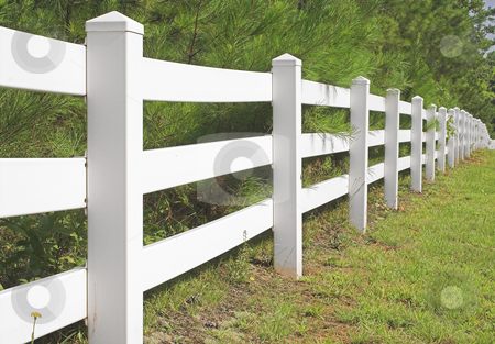 To use this stock image in your creative project, please select the size you need over to the right and click the "Add to Cart" button.
Your downloaded image will come with the Cutcaster watermark removed so don’t worry about the watermark you see on this page. Split Rail Fence stock photo, A decorative white split rail fence. by Robert Byron