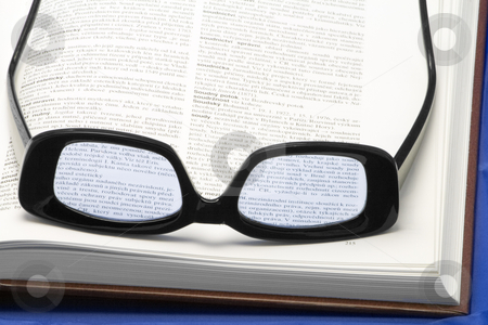 To use this stock image in your creative project, please select the size you need over to the right and click the "Add to Cart" button.
Your downloaded image will come with the Cutcaster watermark removed so don’t worry about the watermark you see on this page. Glasses on a book stock photo, Glasses (eyewear) on a book - close-up by Petr Koudelka