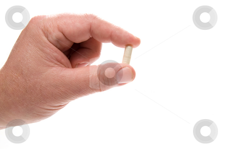 To use this stock image in your creative project, please select the size you need over to the right and click the "Add to Cart" button.
Your downloaded image will come with the Cutcaster watermark removed so don’t worry about the watermark you see on this page. Holding Prescription Medication stock photo, A person holding a prescription medical pill. by Robert Byron
