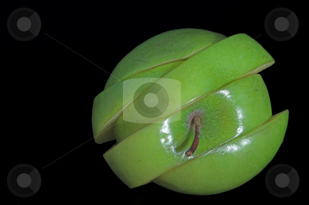 To use this stock image in your creative project, please select the size you need over to the right and click the "Add to Cart" button.
Your downloaded image will come with the Cutcaster watermark removed so don’t worry about the watermark you see on this page. Sliced Apple stock photo, A sliced green apple in a stack. by Robert Byron