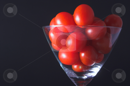 To use this stock image in your creative project, please select the size you need over to the right and click the "Add to Cart" button.
Your downloaded image will come with the Cutcaster watermark removed so don’t worry about the watermark you see on this page. Tomato Martini stock photo, Small grape tomatoes in a martini glass. by Robert Byron