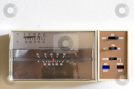 To use this stock image in your creative project, please select the size you need over to the right and click the "Add to Cart" button.
Your downloaded image will come with the Cutcaster watermark removed so don’t worry about the watermark you see on this page. Thermostat stock photo, An indoor thermostat control for heating and air conditioning. by Robert Byron