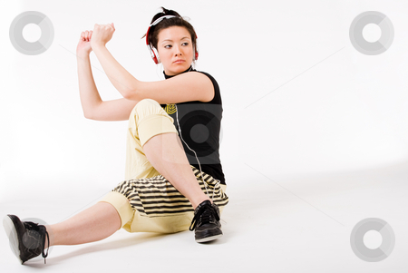 To use this stock image in your creative project, please select the size you need over to the right and click the "Add to Cart" button.
Your downloaded image will come with the Cutcaster watermark removed so don’t worry about the watermark you see on this page. Sitting and dancing on my favourite music stock photo, Young girl enjoying the music and dance on it by Frenk and Danielle Kaufmann