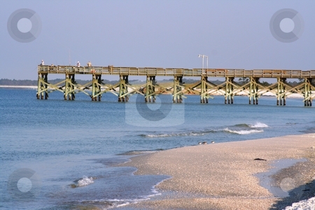 To use this stock image in your creative project, please select the size you need over to the right and click the "Add to Cart" button.
Your downloaded image will come with the Cutcaster watermark removed so don’t worry about the watermark you see on this page. Fishing Pier in Florida stock photo, Fishing pier at Mexico Beach, Florida by Debbie Hayes