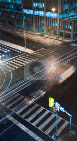 To use this stock image in your creative project, please select the size you need over to the right and click the "Add to Cart" button.
Your downloaded image will come with the Cutcaster watermark removed so don’t worry about the watermark you see on this page. Road Intersection at night stock photo, Cityview of an intersection at night by Vlad Podkhlebnik