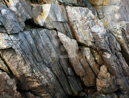 To use this stock image in your creative project, please select the size you need over to the right and click the "Add to Cart" button.
Your downloaded image will come with the Cutcaster watermark removed so don’t worry about the watermark you see on this page. Granite Rock Walls - Climb stock photo, Granite walls in Maine, showing striations of gray by Tom and Beth Pulsipher