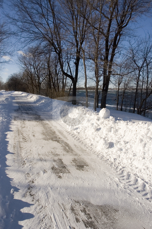 To use this stock image in your creative project, please select the size you need over to the right and click the "Add to Cart" button.
Your downloaded image will come with the Cutcaster watermark removed so don’t worry about the watermark you see on this page. Winter stock photo, Sunny winter landscape with trees and trails by Vlad Podkhlebnik