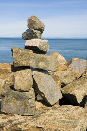 To use this stock image in your creative project, please select the size you need over to the right and click the "Add to Cart" button.
Your downloaded image will come with the Cutcaster watermark removed so don’t worry about the watermark you see on this page. Rock statue stock photo, A rock statue built near the ocean by Vlad Podkhlebnik