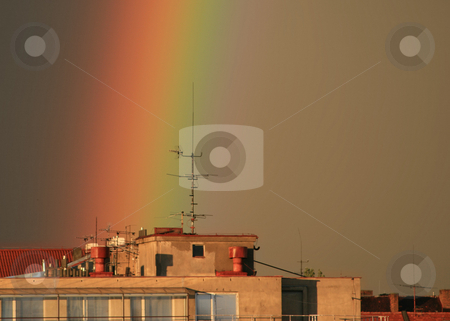 To use this stock image in your creative project, please select the size you need over to the right and click the "Add to Cart" button.
Your downloaded image will come with the Cutcaster watermark removed so don’t worry about the watermark you see on this page. Rainbow stock photo, A part of a rainbow over the roof of a block in the city of Prague by Petr Koudelka