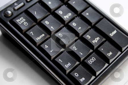 To use this stock image in your creative project, please select the size you need over to the right and click the "Add to Cart" button.
Your downloaded image will come with the Cutcaster watermark removed so don’t worry about the watermark you see on this page. Keypad stock photo, A close-up of a common keypad or numeric keyboard. by Petr Koudelka