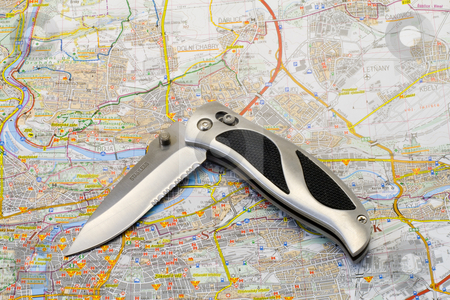 To use this stock image in your creative project, please select the size you need over to the right and click the "Add to Cart" button.
Your downloaded image will come with the Cutcaster watermark removed so don’t worry about the watermark you see on this page. Knife on a map stock photo, A knife lying on a map - close up by Petr Koudelka