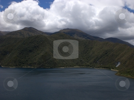 To use this stock image in your creative project, please select the size you need over to the right and click the "Add to Cart" button.
Your downloaded image will come with the Cutcaster watermark removed so don’t worry about the watermark you see on this page. Ecuador lake with clouds stock photo, Ecuador Trip by Scott P Taylor