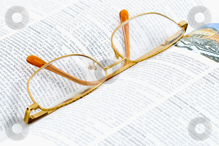 To use this stock image in your creative project, please select the size you need over to the right and click the "Add to Cart" button.
Your downloaded image will come with the Cutcaster watermark removed so don’t worry about the watermark you see on this page. Glasses on a Book stock photo, Glasses lying on an open book - close up by Petr Koudelka