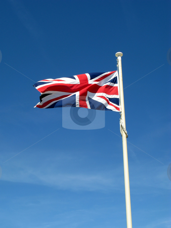 To use this stock image in your creative project, please select the size you need over to the right and click the "Add to Cart" button.
Your downloaded image will come with the Cutcaster watermark removed so don’t worry about the watermark you see on this page. The Union Flag of Great Britain blowing in the wind. stock photo, The Union Flag of Great Britain blowing in the wind. by Stephen Rees