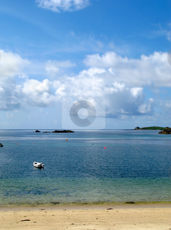 To use this stock image in your creative project, please select the size you need over to the right and click the "Add to Cart" button.
Your downloaded image will come with the Cutcaster watermark removed so don’t worry about the watermark you see on this page. White clouds and blue sky over a calm sea, Porthcressa St. Mary's Isles of Scilly. stock photo, White clouds and blue sky over a calm sea, Porthcressa St. Mary's Isles of Scilly. by Stephen Rees