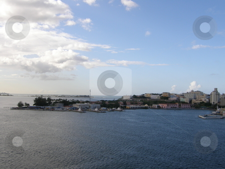 To use this stock image in your creative project, please select the size you need over to the right and click the "Add to Cart" button.
Your downloaded image will come with the Cutcaster watermark removed so don’t worry about the watermark you see on this page. San Juan in Puerto Rico in the Caribbean stock photo, by Ritu Jethani