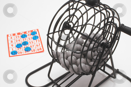 To use this stock image in your creative project, please select the size you need over to the right and click the "Add to Cart" button.
Your downloaded image will come with the Cutcaster watermark removed so don’t worry about the watermark you see on this page. Bingo Cage and Card stock photo, A bingo cage, balls with numbers, card and markers. by Robert Byron
