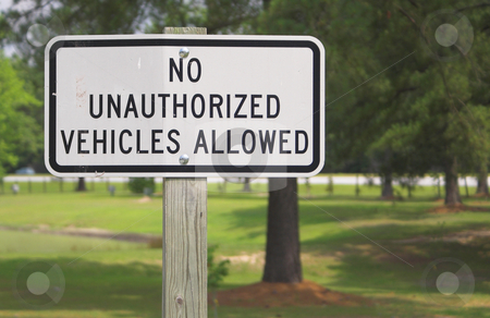To use this stock image in your creative project, please select the size you need over to the right and click the "Add to Cart" button.
Your downloaded image will come with the Cutcaster watermark removed so don’t worry about the watermark you see on this page. No Unauthorized Vehicles Allowed stock photo, A sign stating No Unauthorized Vehicles Allowed. by Robert Byron
