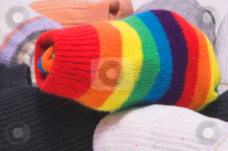 To use this stock image in your creative project, please select the size you need over to the right and click the "Add to Cart" button.
Your downloaded image will come with the Cutcaster watermark removed so don’t worry about the watermark you see on this page. Striped Knit Socks stock photo, Clean and colorful striped knitted toe socks. by Robert Byron