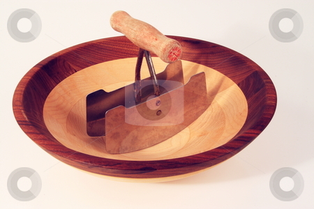 To use this stock image in your creative project, please select the size you need over to the right and click the "Add to Cart" button.
Your downloaded image will come with the Cutcaster watermark removed so don’t worry about the watermark you see on this page. Chopping Bowl stock photo, Wooden bowl for chopping food the old fashion way by Jack Schiffer