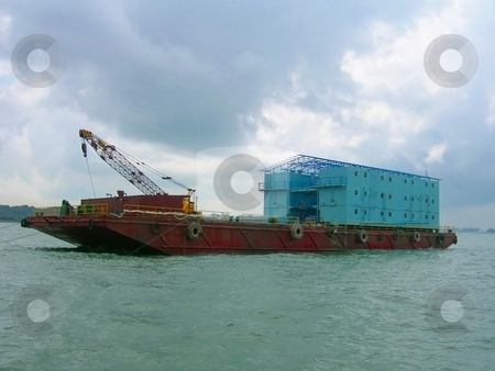 To use this stock image in your creative project, please select the size you need over to the right and click the "Add to Cart" button.
Your downloaded image will come with the Cutcaster watermark removed so don’t worry about the watermark you see on this page. Barge in open sea stock photo, by ZaKaRiA- MaStErPiEcE