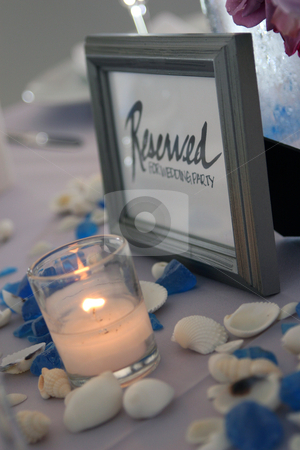 To use this stock image in your creative project, please select the size you need over to the right and click the "Add to Cart" button.
Your downloaded image will come with the Cutcaster watermark removed so don’t worry about the watermark you see on this page. Wedding Table stock photo, Reserved for wedding party by MIca Mulloy