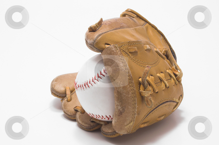 To use this stock image in your creative project, please select the size you need over to the right and click the "Add to Cart" button.
Your downloaded image will come with the Cutcaster watermark removed so don’t worry about the watermark you see on this page. Baseball and Baseball Glove stock photo, A baseball inside of a baseball glove. by Robert Byron