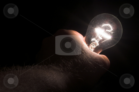 To use this stock image in your creative project, please select the size you need over to the right and click the "Add to Cart" button.
Your downloaded image will come with the Cutcaster watermark removed so don’t worry about the watermark you see on this page. Holding a Light Bulb stock photo, A person powering a light bulb by holding it. by Robert Byron