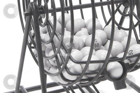 To use this stock image in your creative project, please select the size you need over to the right and click the "Add to Cart" button.
Your downloaded image will come with the Cutcaster watermark removed so don’t worry about the watermark you see on this page. Bingo Cage stock photo, A bingo game cage with numbered balls. by Robert Byron