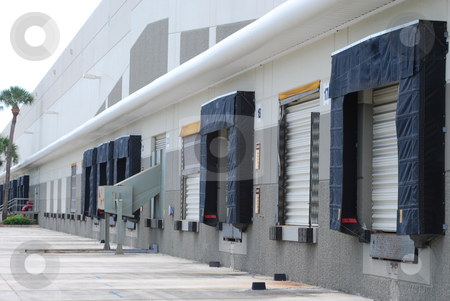 To use this stock image in your creative project, please select the size you need over to the right and click the "Add to Cart" button.
Your downloaded image will come with the Cutcaster watermark removed so don’t worry about the watermark you see on this page. Loading Docks stock photo, Loading docks empty waiting for delivery by Robert Cabrera