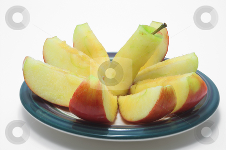 To use this stock image in your creative project, please select the size you need over to the right and click the "Add to Cart" button.
Your downloaded image will come with the Cutcaster watermark removed so don’t worry about the watermark you see on this page. Sliced Red Apple stock photo, A red delicious apple sliced on a plate. by Robert Byron