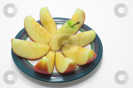 To use this stock image in your creative project, please select the size you need over to the right and click the "Add to Cart" button.
Your downloaded image will come with the Cutcaster watermark removed so don’t worry about the watermark you see on this page. Sliced Red Apple stock photo, A red delicious apple sliced on a plate. by Robert Byron