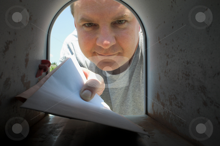To use this stock image in your creative project, please select the size you need over to the right and click the "Add to Cart" button.
Your downloaded image will come with the Cutcaster watermark removed so don’t worry about the watermark you see on this page. Mailman stock photo, A mailman delivering mail to a mailbox. by Robert Byron