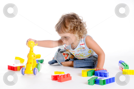 To use this stock image in your creative project, please select the size you need over to the right and click the "Add to Cart" button.
Your downloaded image will come with the Cutcaster watermark removed so don’t worry about the watermark you see on this page. Boy and Toys stock photo, Little Curly-headed Boy Play With Toys by Valeriy Mazur