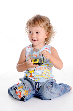 To use this stock image in your creative project, please select the size you need over to the right and click the "Add to Cart" button.
Your downloaded image will come with the Cutcaster watermark removed so don’t worry about the watermark you see on this page. Boy and Tape Measure stock photo, Little Curly-headed Boy and Tape Measure by Valeriy Mazur