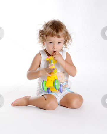 To use this stock image in your creative project, please select the size you need over to the right and click the "Add to Cart" button.
Your downloaded image will come with the Cutcaster watermark removed so don’t worry about the watermark you see on this page. Boy and Giraffe 2 stock photo, Little Curly-headed Boy and Toy Giraffe by Valeriy Mazur