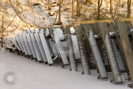To use this stock image in your creative project, please select the size you need over to the right and click the "Add to Cart" button.
Your downloaded image will come with the Cutcaster watermark removed so don’t worry about the watermark you see on this page. Winter Picnic stock photo, Picnic tables at the park covered in snow by Johan Knelsen