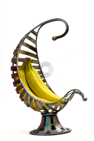 To use this stock image in your creative project, please select the size you need over to the right and click the "Add to Cart" button.
Your downloaded image will come with the Cutcaster watermark removed so don’t worry about the watermark you see on this page. Side Banana Basket stock photo, Isolated Bananas in a banana basket with a side view by Johan Knelsen